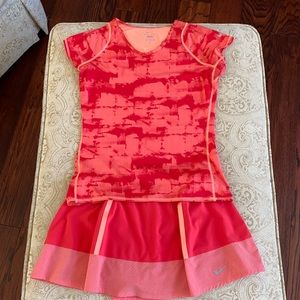 Beautiful coral Nike tennis skirt and top. Top size M, skort size L